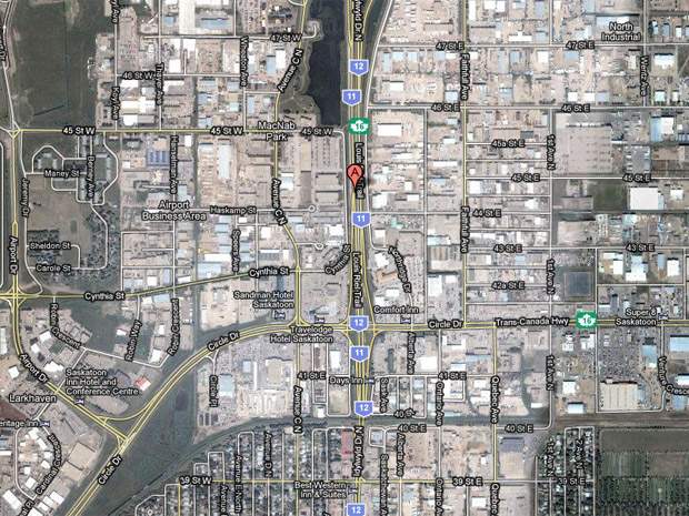 Trucker charged after rollover in Saskatoon leads to fuel spill, road closure - image