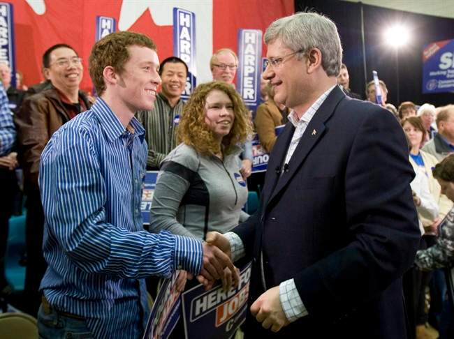 Prime Minister Stephen Harper shakes hands with supporters following a campaign rally in Stratford, P.E.I., Sunday May 1, 2011.