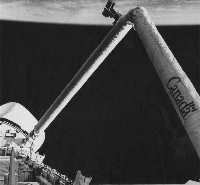 This 1981 photo shows the Canadian-designed and built Remote Manipulator System (CANADARM) deployed in outer space during a flight of the Space Shuttle Columbia. The arm is used to deploy and retrieve satellites. The shuttle was orbiting in an inverted position, and Earth's horizon shows a slight curvature at top of photo. The original Canadarm, which flexed its robotic muscles for the first time almost 30 years ago, is making its last trip into space on Friday before coming home. The giant arm, which originally cost $108 million, will be on board U.S. Space Shuttle Endeavour, which is also on its final flight to the International Space Station. THE CANADIAN PRESS/AP.