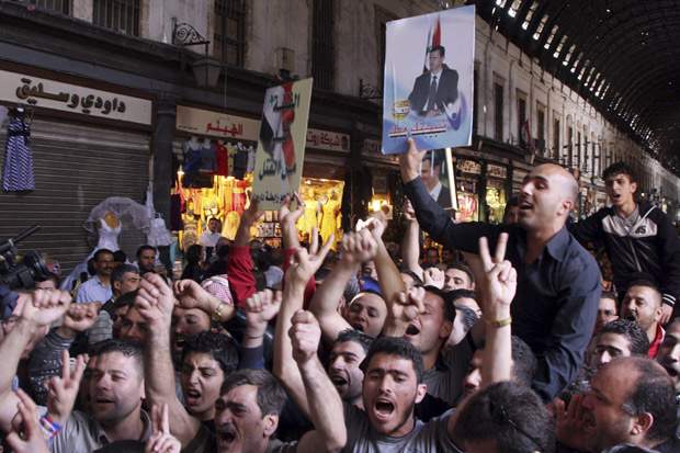 Syrian security forces kill 16 protesters at anti-government demonstrations - image