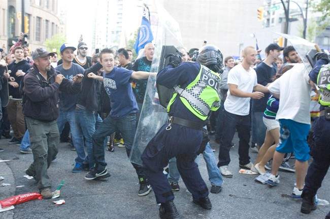 Vancouver Canucks fans riot following Game 7 of the NHL Stanley Cup final in downtown Vancouver on Wednesday, June 15, 2011.