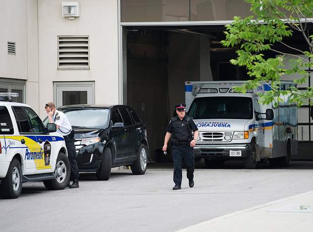 Premier McGuinty expresses condolences for family of dead police officer - image