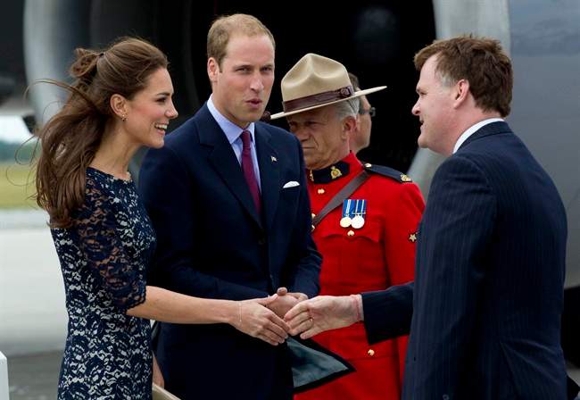 The Duke and Duchess of Cambridge William and Kate are greeted by Foreign Affairs Minister John Baird upon their arrival in Ottawa on Thursday June 30, 2011. THE CANADIAN PRESS/Frank Gunn.