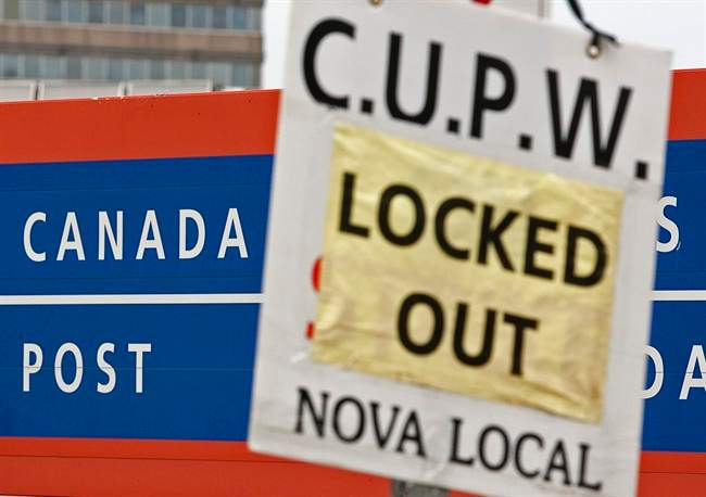 A sign outside the main postal facility in Halifax on Saturday, June 18, 2011. THE CANADIAN PRESS/Andrew Vaughan.