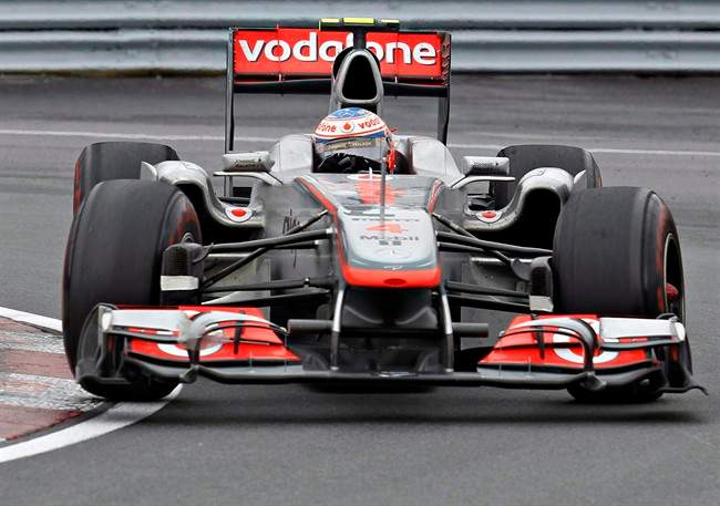 As Formula One cars reach staggering speeds, the technology that's used to track them is moving even faster. Everything from speed, of course, to every gear change, to the pressure in each tire is recorded by the car's multitude of sensors and streamed live to engineers on site or back at the team's often far-away headquarters. McLaren Mercedes driver Jenson Button, of Britain, is shown racing to victory at the Canadian Grand Prix Sunday, June 12, 2011 in Montreal. THE CANADIAN PRESS/Jacques Boissinot.