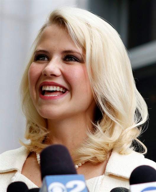 FILE - This May 25, 2011 file photo shows Elizabeth Smart talking to the media in front of the Frank E. Moss Federal Courthouse in Salt Lake City. Smart who was kidnapped, raped and held captive at age 14 by a Salt Lake City street preacher is taking a job as a commentator for ABC News. ABC spokeswoman Julie Townsend tells The Associated Press that Elizabeth Smart can provide viewers with a unique perspective on missing persons cases. She says the deal with the now 23-year-old Smart have been in the works for some time. (AP Photo/Jim Urquhart, File).