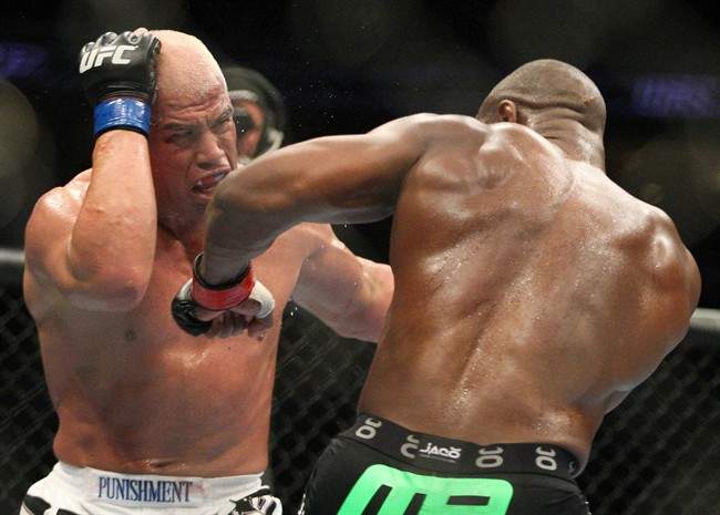 Rashad Evans throws a punch to Tito Ortiz in the second round of a bout during UFC 133 inn August 2011 in Philadelphia.