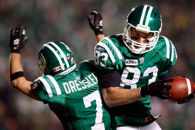 Saskatchewan Roughriders Andy Fantuz, right, celebrates his touchdown with Weston Dressler during overtime CFL Western semi-final football action in Regina, Sask., Sunday, Nov. 14, 2010. Fantuz is returning to the Saskatchewan Roughriders.The all-star slotback tweeted this morning that he will be at the CFL team's practice today, effectively putting his NFL aspirations on hold.THE CANADIAN PRESS/Jeff McIntosh.
