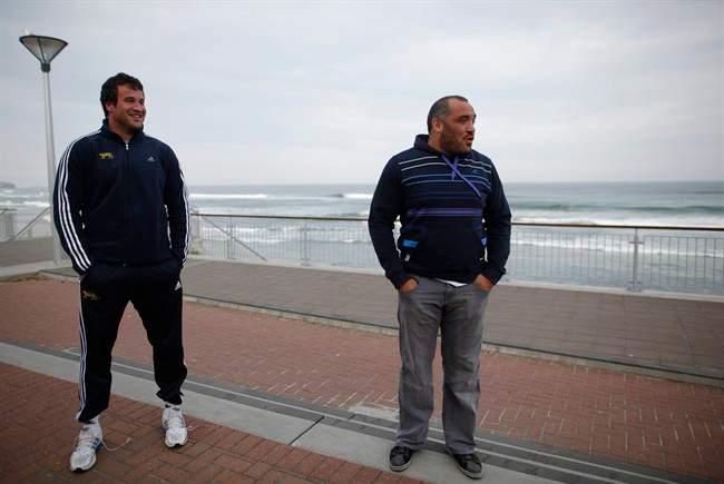 Argentina rugby players Alejandro Campos, left, and Rodrigo Roncero walk along the boardwalk at St Clair Beach in Dunedin, New Zealand, Wednesday, Sept. 7, 2011. Argentina will play their opening Rugby World Cup game against England on Sep.10.(AP Photo/Natacha Pisarenko).