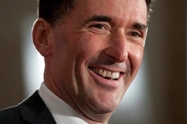 NDP MP Paul Dewar laughs as he speaks with media after announcing he will seek the leadership of the party during an event in Ottawa, Sunday October 2, 2011. THE CANADIAN PRESS/Adrian Wyld.