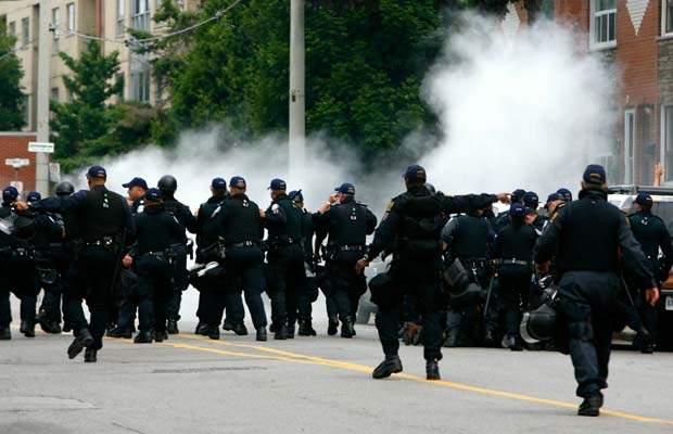 Police patrol a Toronto street during the G20. 
