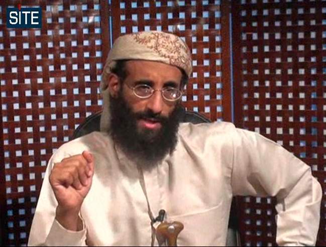 FILE - In this In this Monday, Nov. 8, 2010 file image taken from video and released by SITE Intelligence Group, Anwar al-Awlaki speaks in a video message posted on radical websites. Al-Qaida's Yemeni offshoot on Monday confirmed the killing of U.S.-born militant cleric Anwar al-Awlaki late last month and vowed to avenge the prominent progagadist's death. (AP Photo/SITE Intelligence Group, File) NO SALES, MANDATORY CREDIT.