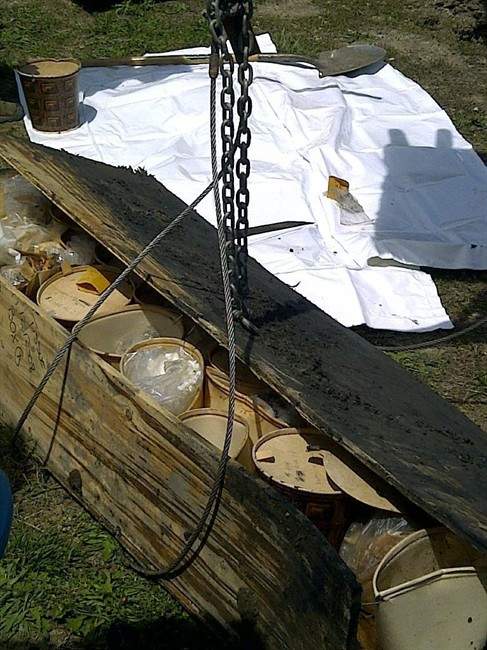 This undated photo provided by the Cook County Sheriff's Department shows buckets containing jaw bones and teeth of victims of serial killer John Wayne Gacy that were exhumed by authorities. The Cook County Sheriff's Department last spring secretly exhumed the bones of the 8 victims who were never identified in the hopes that scientific tests that were not around between 1972 and 1978 when Gacy killed his 33 victims will make identification possible. (AP Photo/Cook County Sheriff's Department).