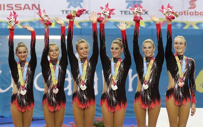 Canada's rhythmic gymnastics team shows off their silver medals at the 2011 Pan American Games in Guadalajara, Mexico on Sunday, Oct. 15, 2011. From left, Katrina Cameron, Anjelika Reznik, Anastasiya Muntyanu, Alexandra Landry, Kelsey Titmarsh and Rose Cossar THE CANADIAN PRESS/HO-COC/Mike Ridewood.