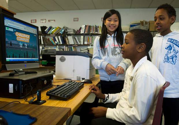 Too much screen time, too little playtime for Canadian kids, report card finds - image