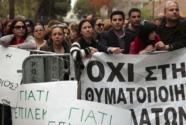 
Citizens of Cyprus protested this week against a government plan to skim a portion of their savings in order to bail out the country's financial sector.