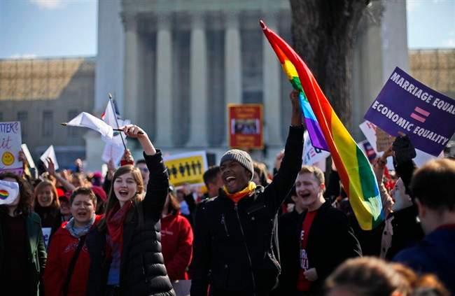 Demonstrators chant outside the Supreme Court in Washington, March 26, 2013. 