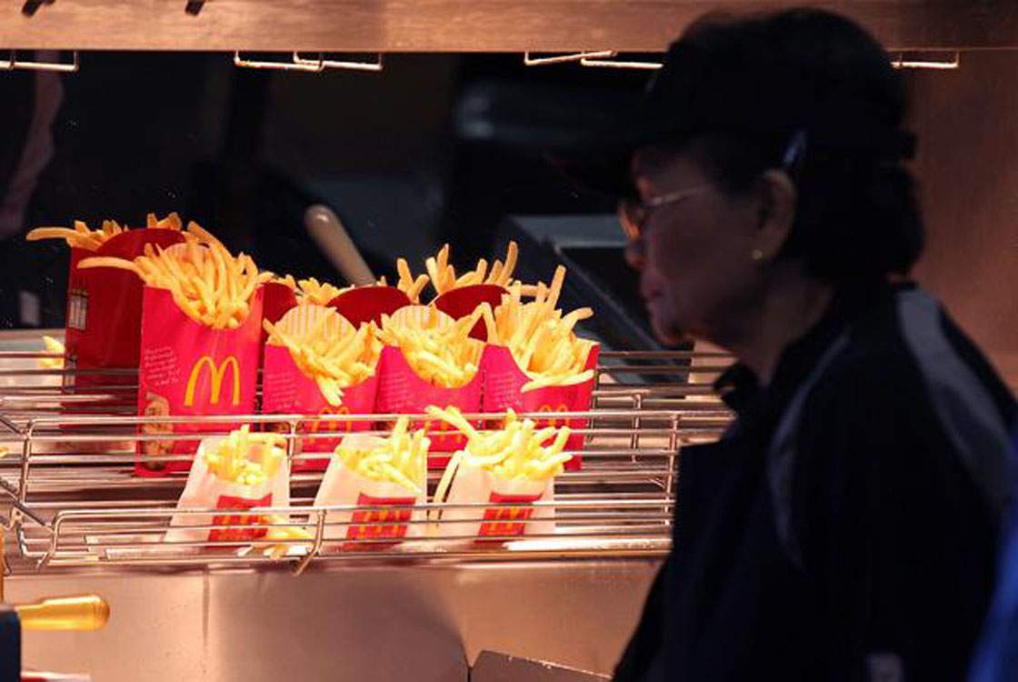 McDonald's french fries sit under a heat lamp during a one-day hiring event at a McDonald's restaurant on April 19;2011 in San Francisco;California.