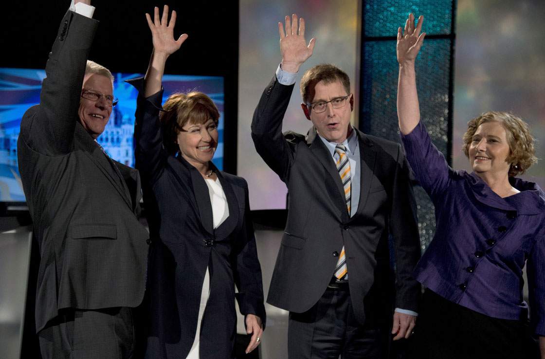 B.C. Conservative leader John Cummins, left to right, B.C. Liberal leader Christy Clark, B.C. NDP leader Adrian Dix and B.C. Green leader Jane Stirk take part in a pre debate photo opt in Vancouver, B.C. Monday, April 29, 2013. 
