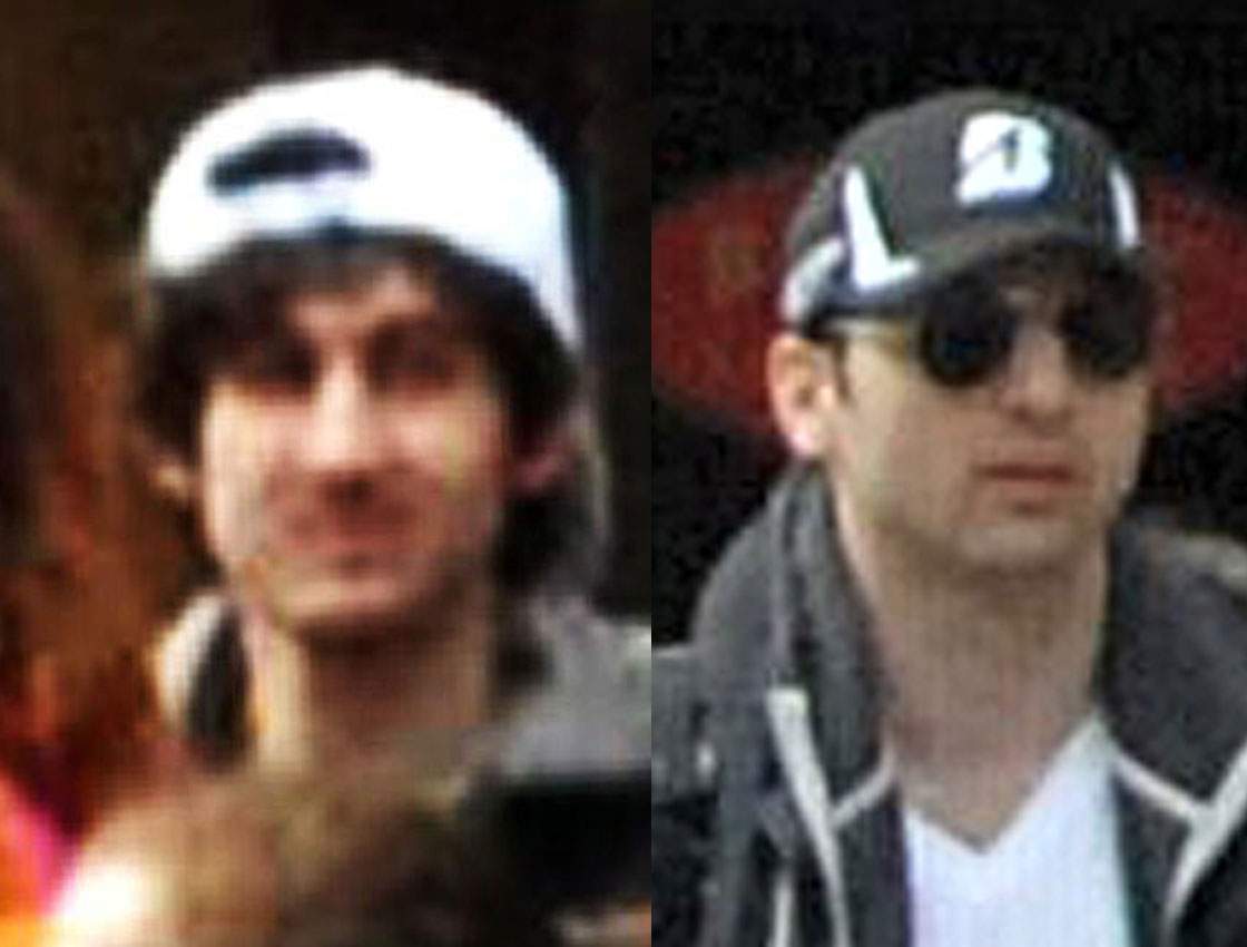 Marathon bombing suspect in the black hat, Tamerlan Tsarnaev, has been killed during a shootout with police, while his brother – the suspect in the white hat, Dzhokhar A. Tsarnaev, is at large.