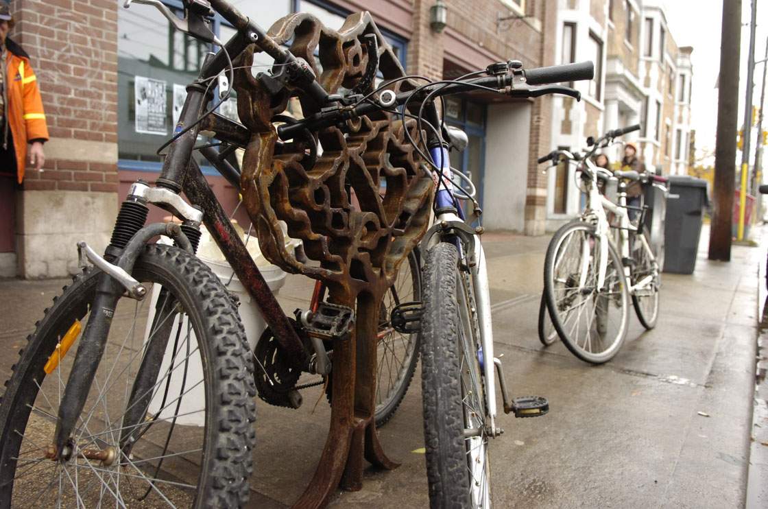 Bikes can be seen locked to bike posts along Queen Street West in this July 2010 file photo.