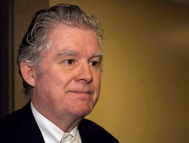 Ernest Fenwick MacIntosh heads from Nova Scotia Court of Appeal in Halifax on Thursday, Oct. 7, 2010. 