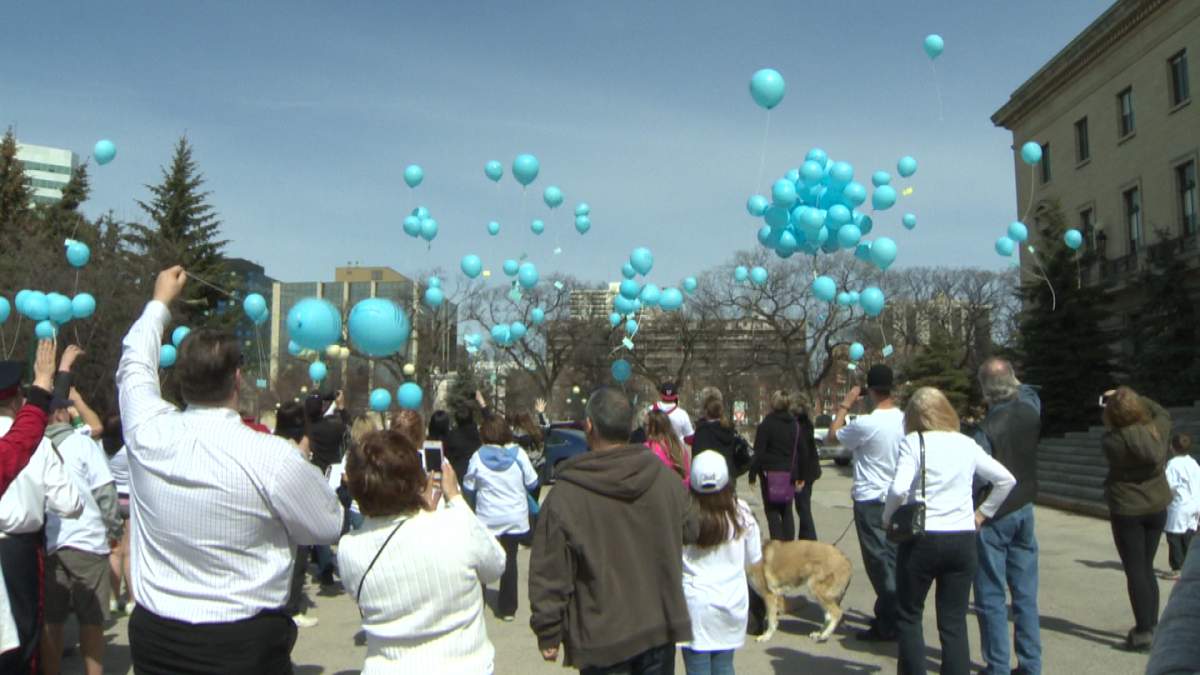 On Saturday, nearly two dozen family and friends of Tim McLean, Chad Davis and T.J. Wiebe walked through downtown Winnipeg in support of victim rights. 