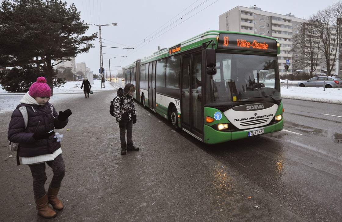 A bus drives on a street in Tallinn, on January 9, 2013. From January 1, 2013, residents of the Estonian capital can use public transports in Tallinn for free after purchasing a special card for 2 euros. 