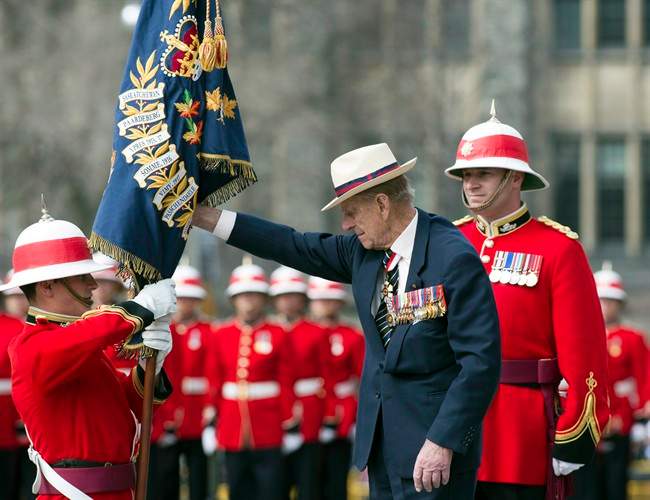 HRH Prince Philip presents a new Regimental Colour to the 3rd Battalion of The Royal Canadian Regiment at the Ontario Legislature in Toronto on Saturday April 27, 2012.