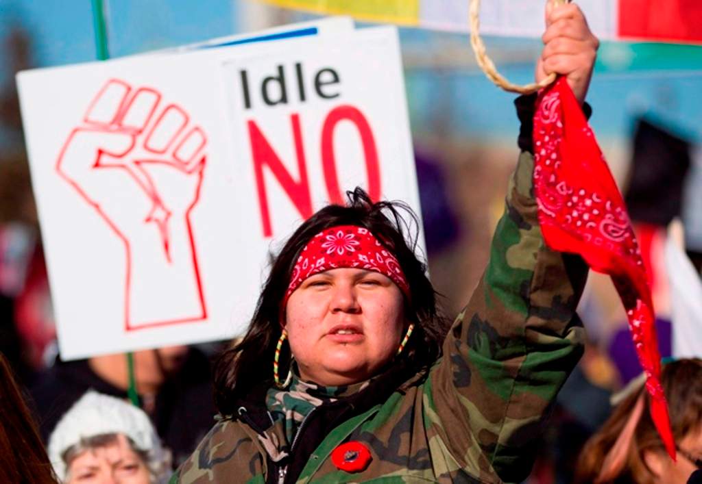 Idle No More protesters demonstrate at the base of the Ambassador Bridge in Windsor Ontario, Wednesday, January 16, 2013. About 1000 demonstrators disrupted traffic to the country's busiest border crossing for several hours. 