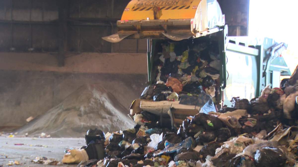 The heaps of garbage bags and other scraps are sorted then processed at the landfill. 