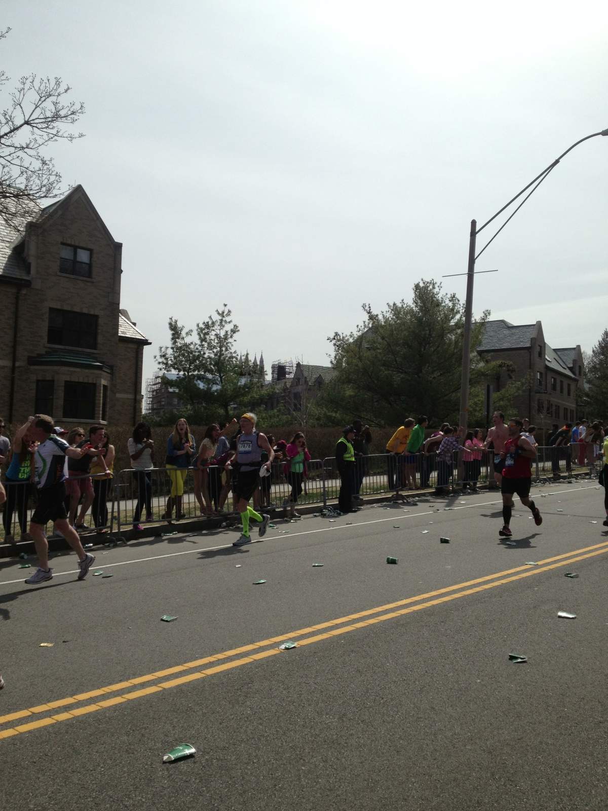 Dr. Robert Steinberg (in the yellow socks) running the Boston Marathon on Monday April 15, 2013 in a picture snapped by his wife