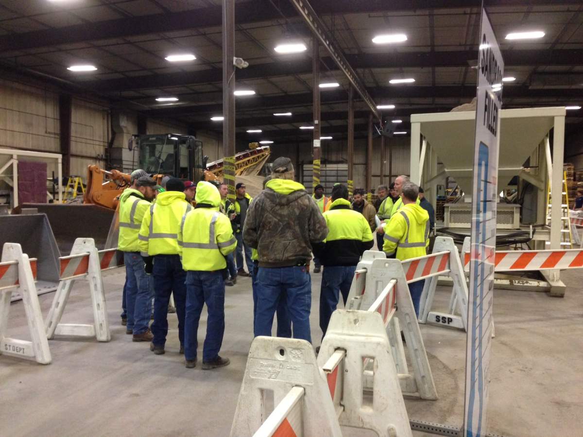 Crews get ready for volunteers to come make sandbags at 'sandbag central' in Fargo, N.D., earlier in April.