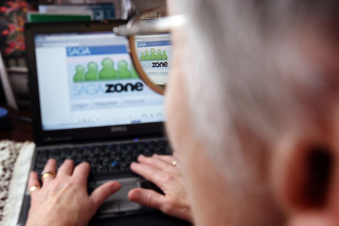 Pensioner Mary Devlin uses a laptop computer to look at the Saga Zone website on November 1, 2007 in London.