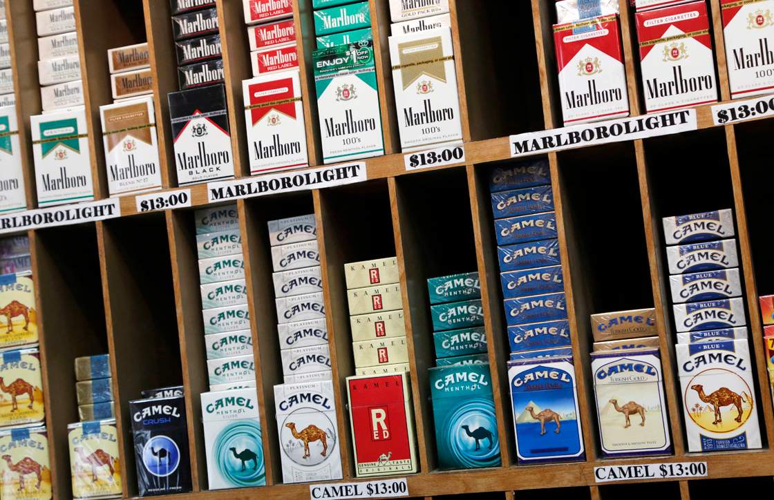 In this March 18, 2013 file photo cigarette packs are displayed for sale at a convenience store in New York.