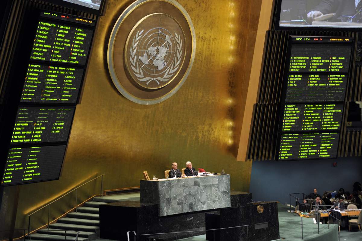 Delegates to the United Nations General Assembly April 2, 2013 after the passage of the first UN treaty regulating the international arms trade. The UN General Assembly on Tuesday adopted the first-ever treaty to regulate the $80-billion-a-year conventional arms trade. The assembly voted 154-3 for a resolution that will open the treaty for signature from June. Syria, North Korea and Iran -- which had blocked the treaty last week -- voted against it. Russia was among the 23 abstentions.