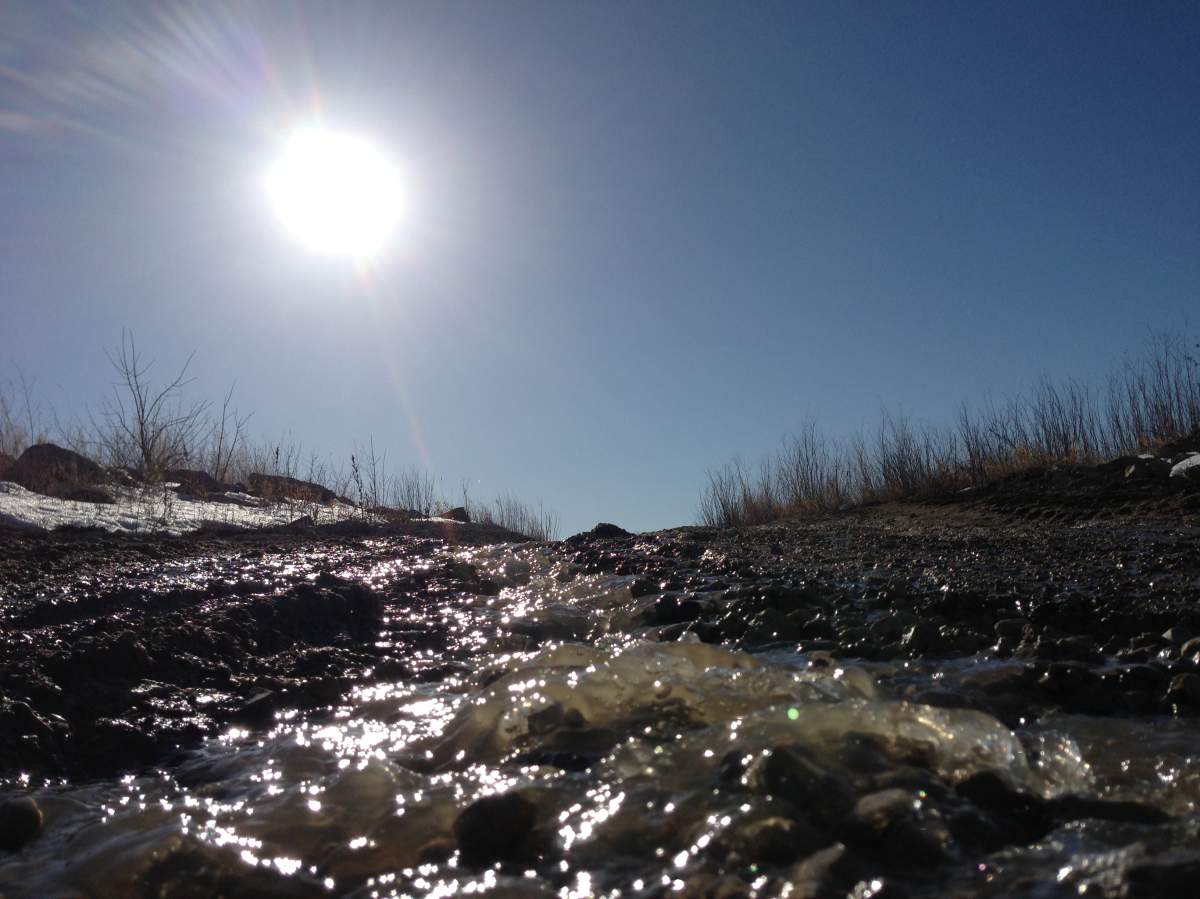flood runoff water Winnipeg Manitoba sun