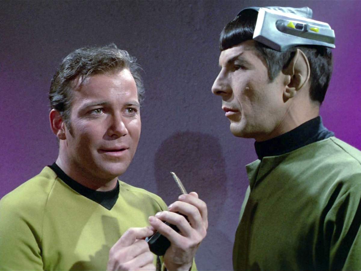 Star Trek’s Captain Kirk, portrayed by William Shatner, talks into his communicator. The inventor of mobile phones said he drew his inspiration from this device.