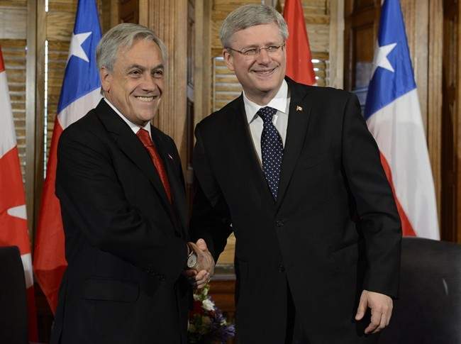 Canadian Prime Minister Stephen Harper meets with Chilean President Sebastian Pinera in his office, Thursday May 30, 2013 on Parliament Hill in Ottawa.