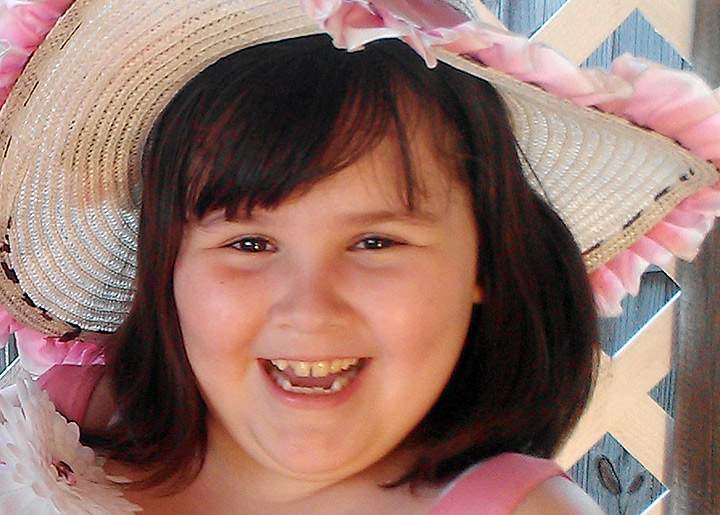 This undated handout photo provided by Brandie Candelaria shows Antonia Candelaria. Candelaria was killed when a tornado struck Plaza Towers Elementary School in Moore, Okla., on Monday, May 20, 2013.