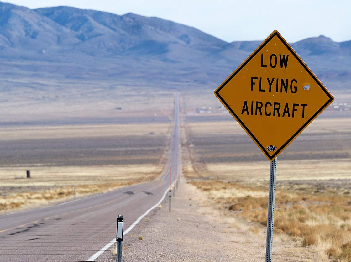Bullet-damaged traffic sign along the Extraterrestrial Highway (highway 375) near Rachel, Nevada. 