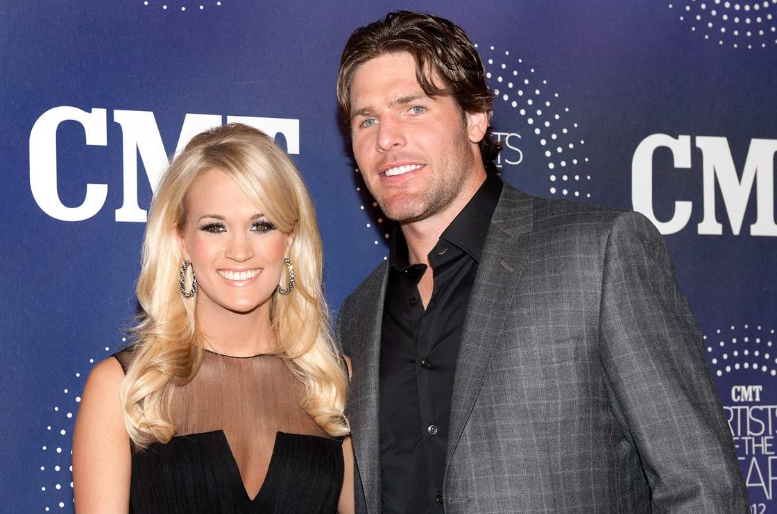 Carrie Underwood and Mike Fisher. (Getty Images)