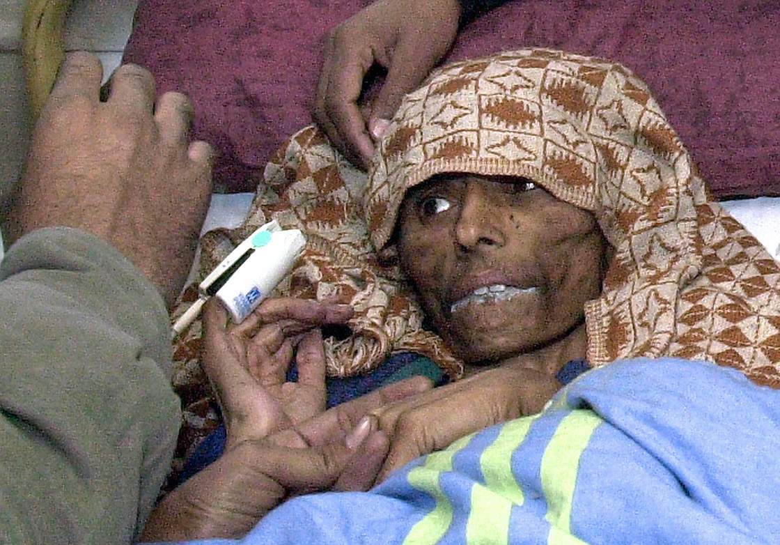 A Pakistani Kashmiri earthquake survivor, Naqsha lies in the intensive care unit (ICU) ward of a hospital in Muzaffarabad, the capital of Pakistan-administered Kashmir, December 12, 2005, following her rescue from the rubble.
