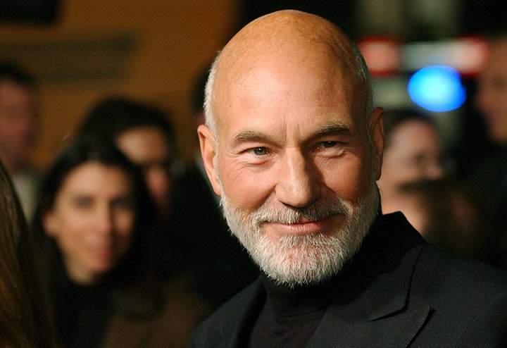 Patrick Stewart poses as he arrives for the world premiere of “Star Trek Nemesis,” Monday, Dec. 9, 2002, in the Hollywood section of Los Angeles.