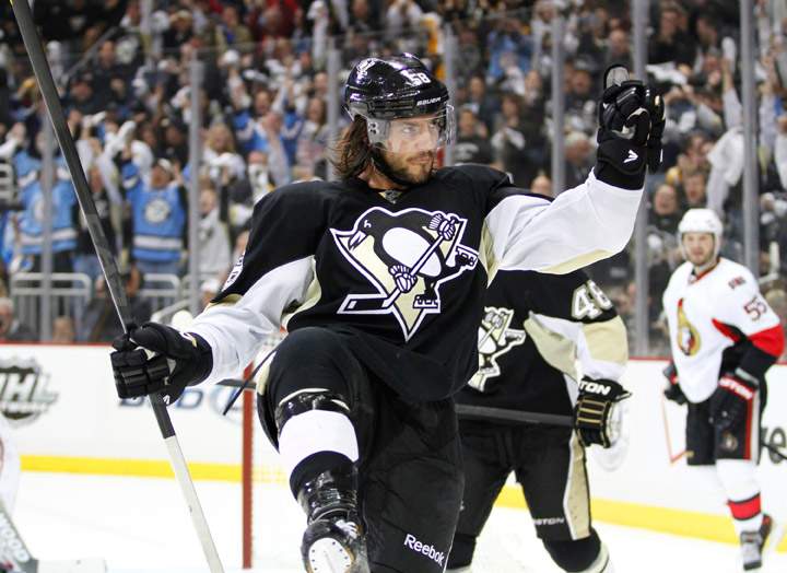 Kris Letang #58 of the Pittsburgh Penguins celebrates after scoring a goal against the Ottawa Senators in Game Five of the Eastern Conference Semifinals during the 2013 NHL Stanley Cup Playoffs at Consol Energy Center on May 24, 2013 in Pittsburgh, Pennsylvania.