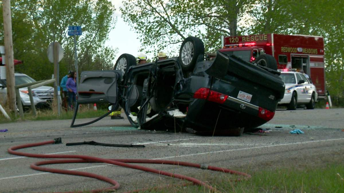RCMP say a Toyota van traveling east on Springbank road rolled onto its roof, trapping two adults and four children inside. 