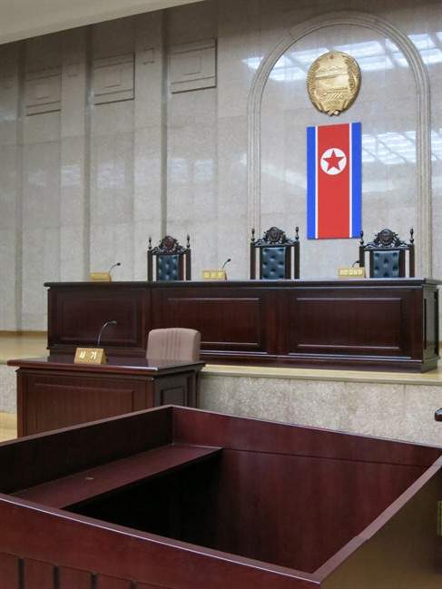 In this March 20, 2013 photo, a North Korean flag hangs inside the interior of Pyongyang’s Supreme Court.