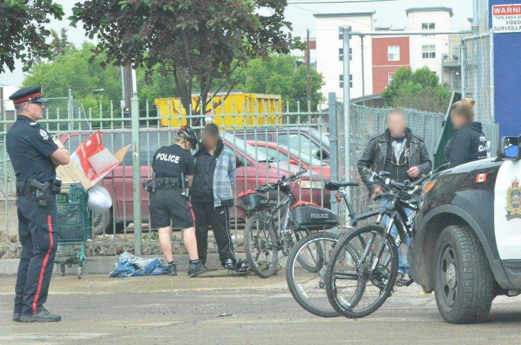 Police make arrests in downtown Edmonton.