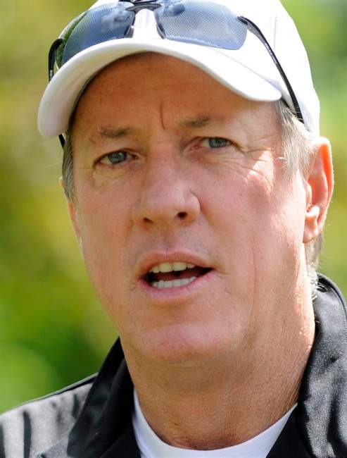 Jim Kelly talks to the media before a press conference in Batavia, N.Y. , Monday June 3, 2013. Kelly says he has been diagnosed with cancer in his upper jaw bone and will have surgery on June 7.