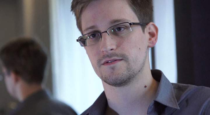 In this handout photo provided by The Guardian, Edward Snowden speaks during an interview in Hong Kong. Snowden, a 29-year-old former technical assistant for the CIA, revealed details of top-secret surveillance conducted by the United States’ National Security Agency regarding telecom data.